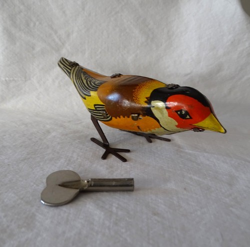 Uccellino latta carica - uccellino,